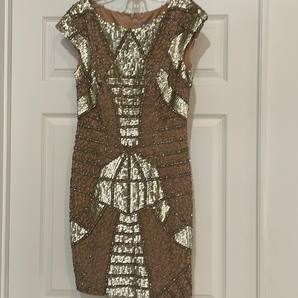 Beautiful fully beaded Jovani mini dress.